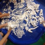 Having some messy fun in shaving foam