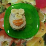 Having fun at snacktime making bread faces