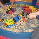 Having fun with diggers in the rainbow rice.