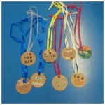 we made some medals for our super dad's for fathers day
