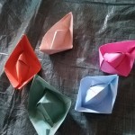 We made some origami boats to put in the water
