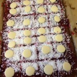 We made coconut lamington cake and decorated it with chocolate buttons